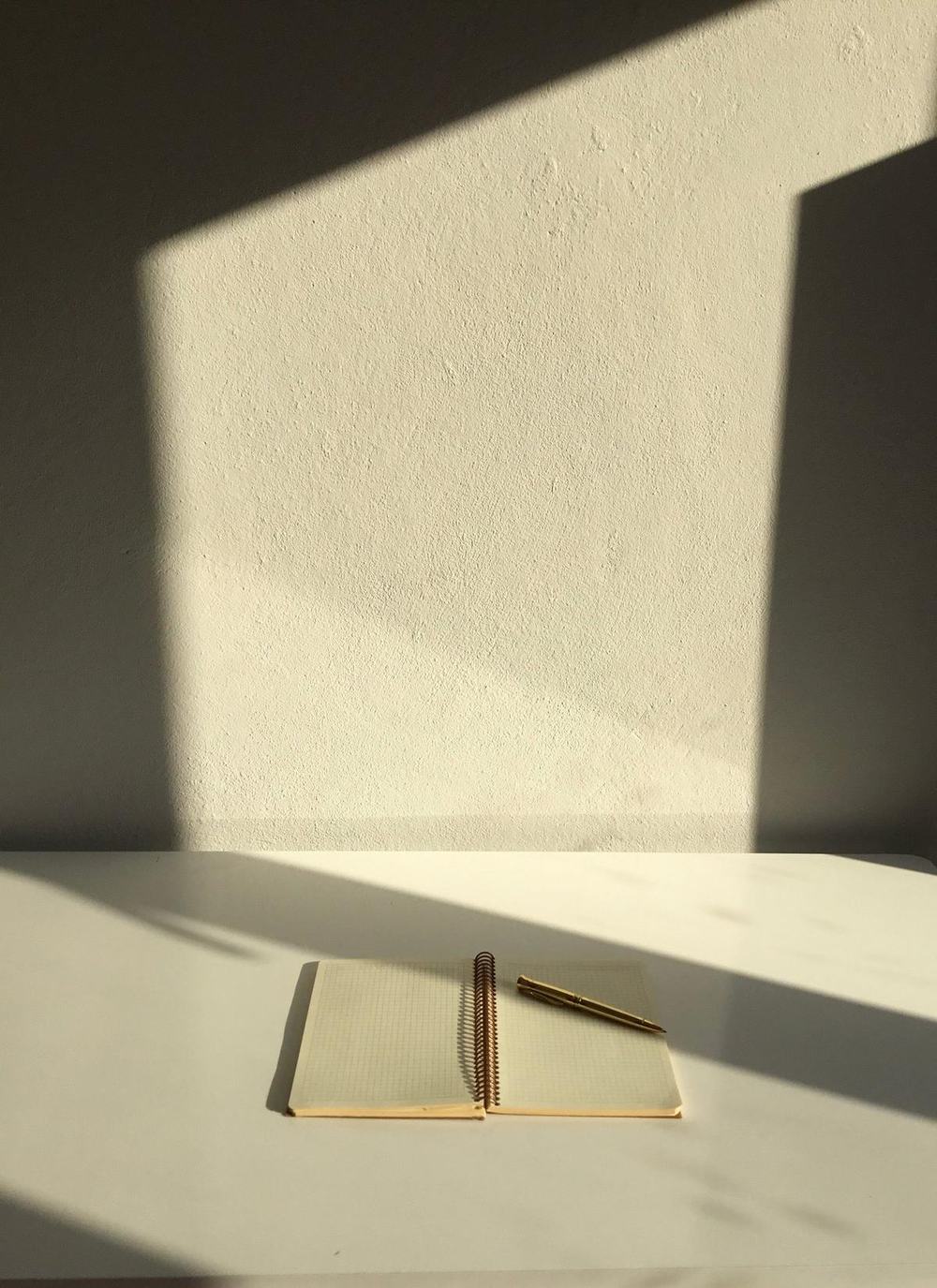 An open notebook in the sunlight