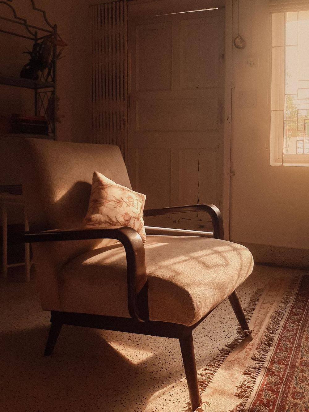 Soft armchair in warm sunlight