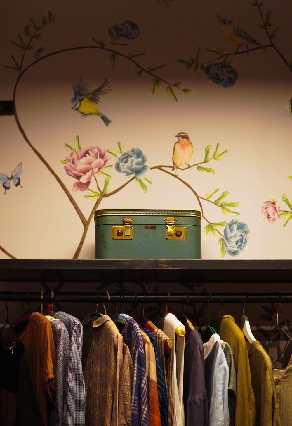Green vintage case on a shelf